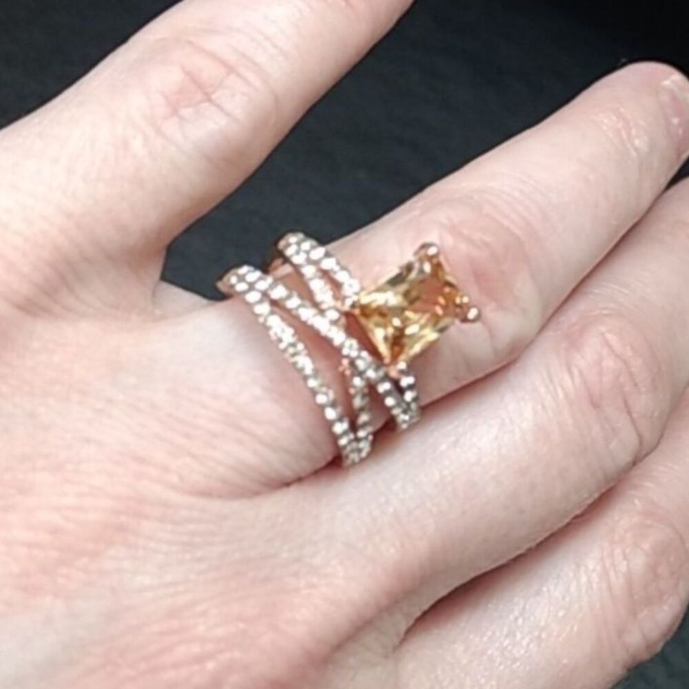 Rose gold colored ring with champagne stone Size 6